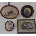 A collection of four miniature portraits, one of a recumbent Springer type spaniel signed with