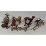 Nine metal figures of dogs including Dachshund, Terriers, Labrador, Greyhound, etc, 18 cm and