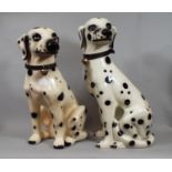 Two very similar ceramic models of seated dalmatians, 45 cm in height