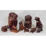 Nine various carved timber figures of dogs, mainly Bulldogs, 23cm max