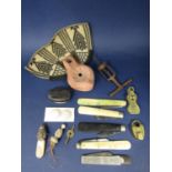 Miscellaneous effects to include an ethnic hat, terracotta lamp, 19th century pen knives, horn