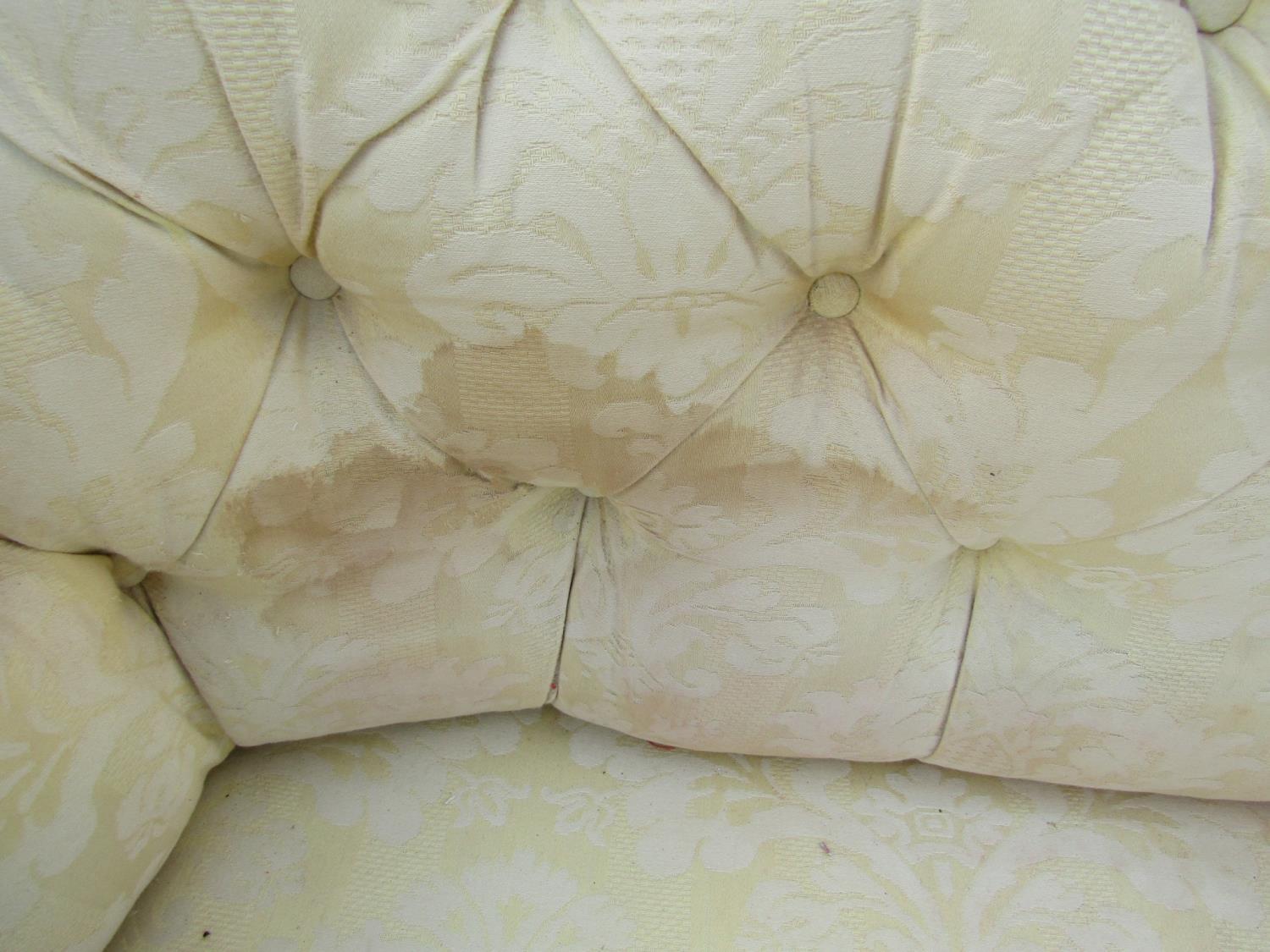 A two seat Chesterfield sofa with repeating floral pattern upholstery buttoned back and rolled arms, - Image 4 of 4