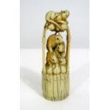 Meiji Period - Ivory Okimono four rats amongst fruit in a wicker basket, signed, 9cm