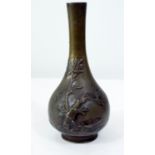 Late 19th century Japanese bronze bottle shaped vase decorated in relief, to the reverse bamboo