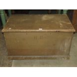 A Victorian pine box with hinged lid, twin lock, side carrying handles and painted initials HB,
