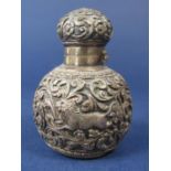 Good quality Indian silver scent bottle embossed with wildlife amidst scrolled foliage, by