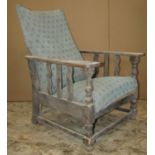 A Victorian spoon back drawing room chair with mustard coloured upholstered seat and button back