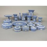 A collection of Wedgwood blue ground Jasperwares including comport, nine vases of various shape,