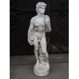 A contemporary cast composition stone figure of a standing classical male figure 88 cm high,