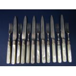 Set of six fruit knives and forks with silver blades and collars, mother-of-pearl handles (12)