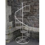 A small novel contemporary cream painted light steel framed conservatory/garden plant stand in the