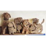 Seven rattan work comical dogs in various poses, max 50cm