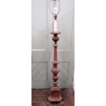 A continental stripped pine free standing lamp standard in the form of a pricket candlestand on