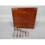 19th century mahogany box, the hinged lid containing three tiered trays over a single drawer, the