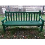 A substantial teak/possibly oak green painted garden bench with slatted seat and back, 2 metres long