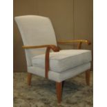A pair of vintage Parker Knoll oak framed open armchairs with oatmeal coloured geometric