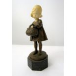 Art Deco style figurene of a young girl with wicker basket raised on an octagonal base, bronze,