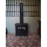 A Hunter cast iron electric faux wood burning stove