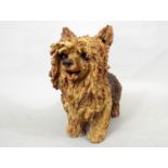 A studio pottery figure of a Yorkshire Terrier by Joanna Cooke, 19cm high