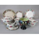 A quantity of Booths Floradora pattern dinnerwares comprising three tureens and covers, sauce boat