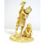 Meiji Period - Ivory Okimono of a farmer and child harvesting crops, signed, 16cm