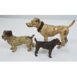A cold cast cold painted bronze figure of a terrier - indistinctly stamped and a