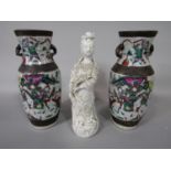 A pair of early 20th century oriental crackle glaze vases with warrior decoration, 25cm tall approx,