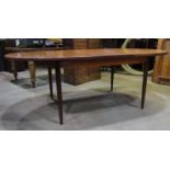 A G plan Fresco D end pull out dining table with single additional bi-fold leaf raised on simple