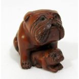 Japanese carved timber Netsuke - Bulldog and pup, signed