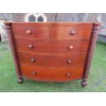 A 19th century mahogany bow fronted bedroom chest of two short over three long graduated drawers