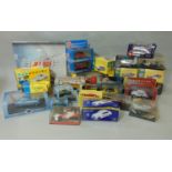 A box containing a large quantity of boxed cars, F1 cars, vintage cars, etc (various makes) together
