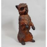 19th century pottery figure of a standing terrier, glass eyes, 31 cm in height