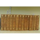 Fourteen volumes of the works of Charles Dickens, leather bound, published Chapman and Hall Ltd,