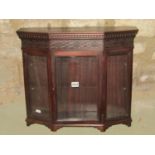 A small good quality wall mounted breakfront display cabinet in the Georgian style with dentil and