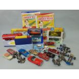 A box containing a quantity of toy cars, including some vintage Corgi examples, a box of Dinky