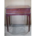 An Edwardian mahogany cutlery canteen/table with inlaid boxwood stringing and crossbanded detail,