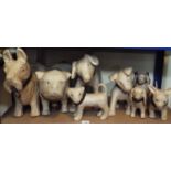 Eight various papier mache models of dogs, various breeds to include Scots, Bulldog, Poodle, etc,