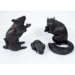 Japanese bronze figure of a standing rat, further smaller bronze rat clasping a nut and a bronze