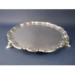 Mappin & Webb 1950s Georgian style salver with raised pie-crust rim upon three scrolled feet,