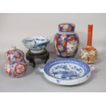 A collection of 219th century and other oriental ceramics including an imari jar and cover with