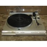 A Garrard B-30 semi auto belt drive record player, together with a quantity of LPs