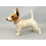 A studio pottery figure of a Jack Russell terrier striding, 25cm high