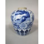 An 18th century oriental blue and white jar of shouldered form with painted stylised floral border