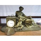 Good quality cast bronze figural mantel clock depicting a reclined maiden holding scythe and wheat