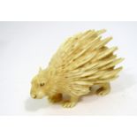 Late 19th century ivory carving of a standing porcupine, 9cm