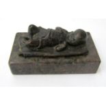 Dora Clarke. Bronze study of a sleeping child. 20thCentury. 11cm raised on a separate marble plinth.
