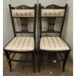 A pair of inlaid Edwardian side or bedroom chairs, with marquetry panels and upholstered seat and