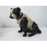 A late 19th century terracotta model of a seated Bulldog, with naturalistic painted finish, 32cm