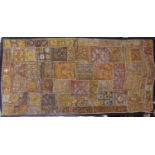 Indian embroidered panel with intricate gold work and sections with black border, 150 x 80 cm