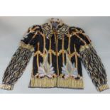 Vintage Ladies opera jacket, heavily sequinned and beaded,mainly in black and gold colours with